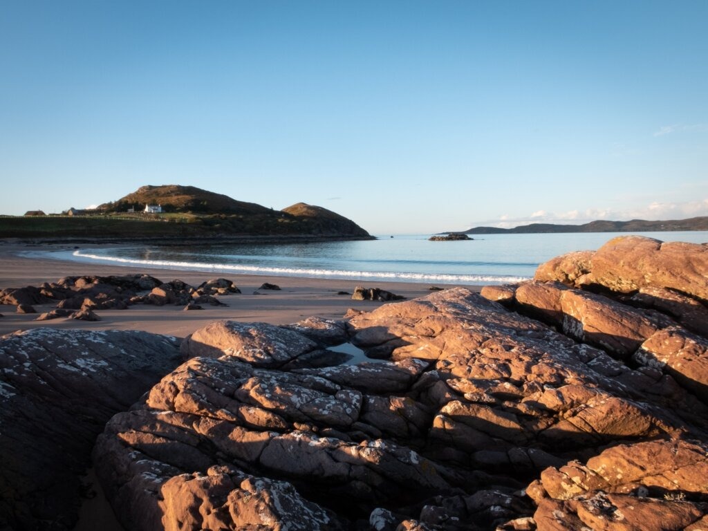 Exploring the dramatic landscape of Firemore Beach, Wester Ross near Gairloch Highland Lodge.